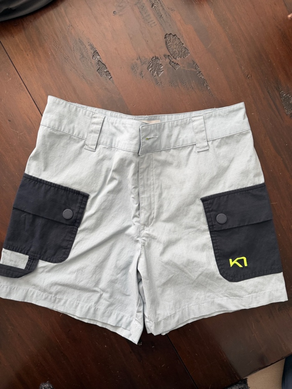 Kari Traa Light Gray Hiking Cargo Shorts with Black Pockets and Neon Logo